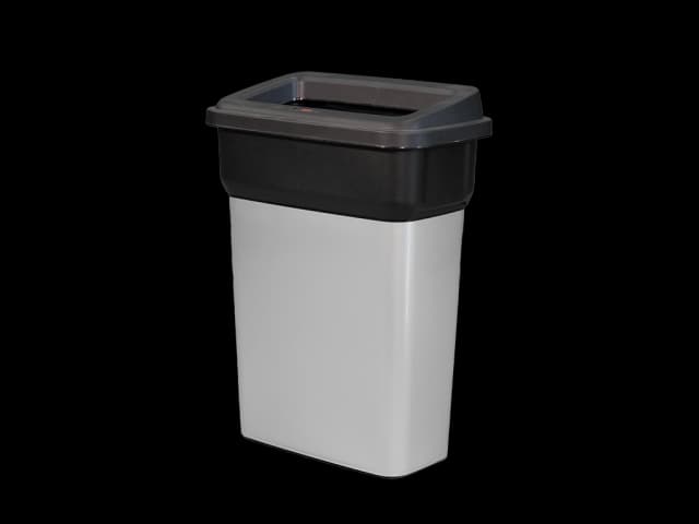 Beholder i metall med sort lokk. Foto.