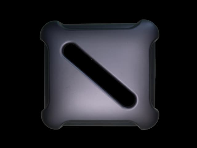 Topp til avfallsbeholder med papirslisse. Foto.