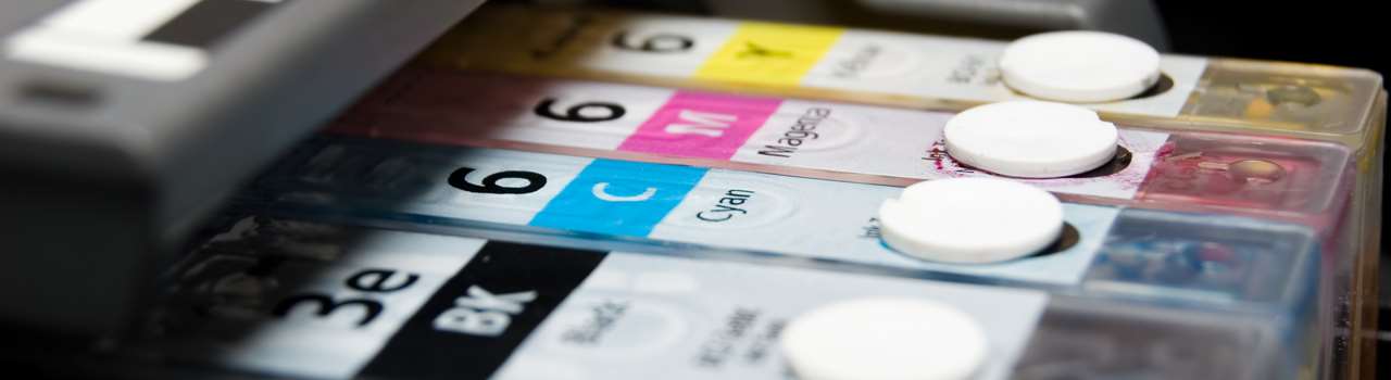 close-up shot of a CMYK ink cartridges for a color printer
shallow depth of field